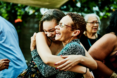 Mother and child hugging each other